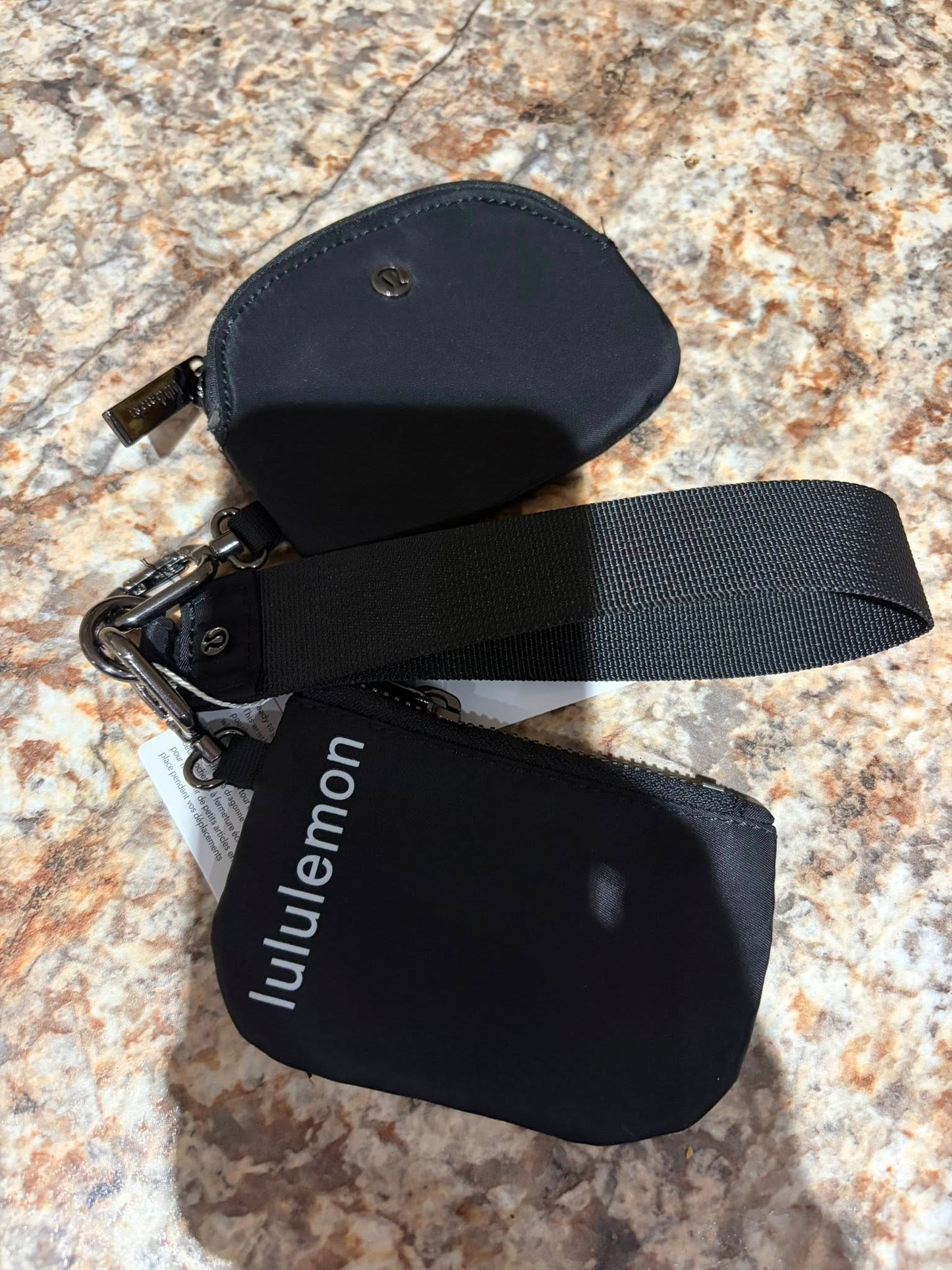 Inspired dual pouch wristlet