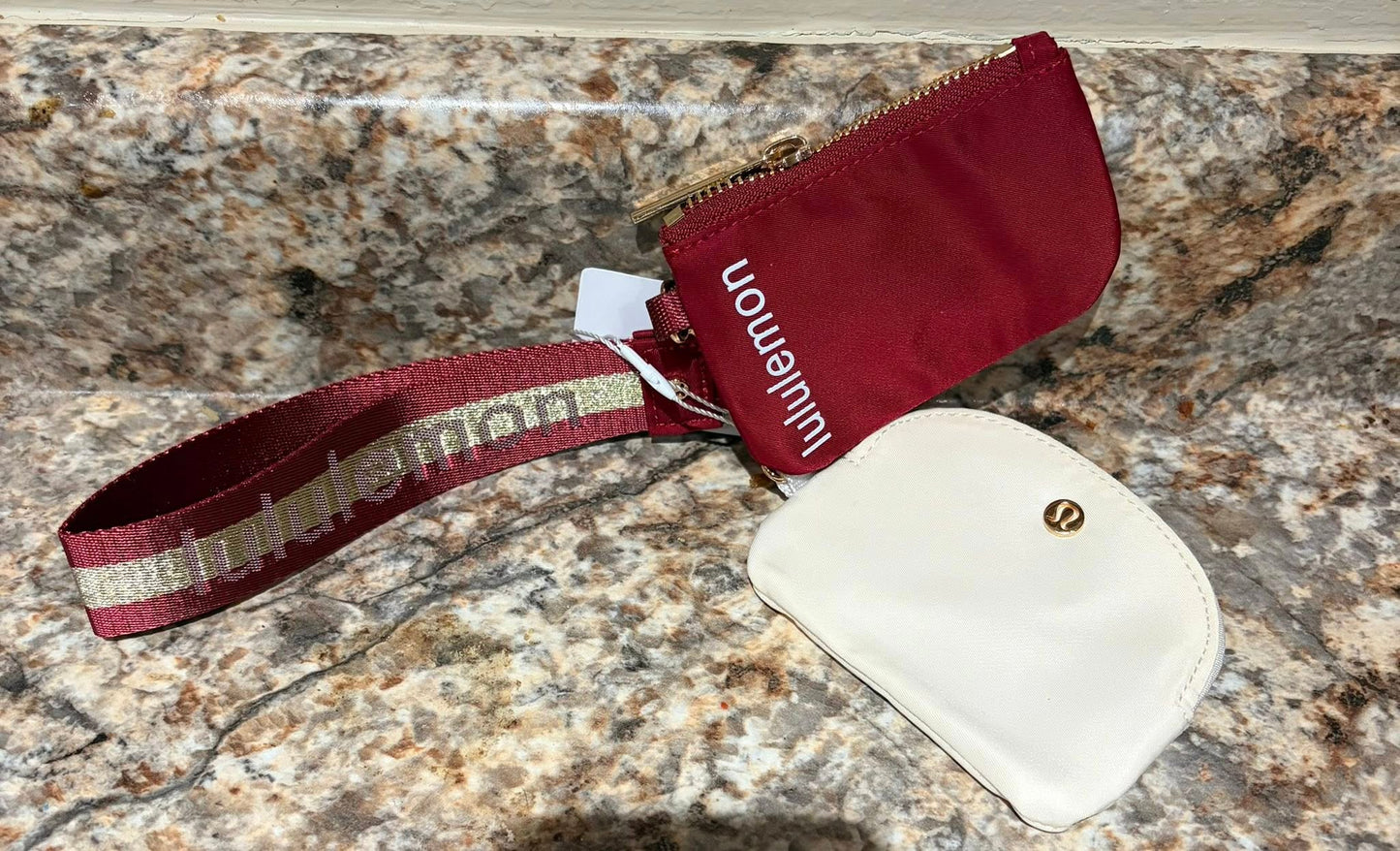 Inspired dual pouch wristlet